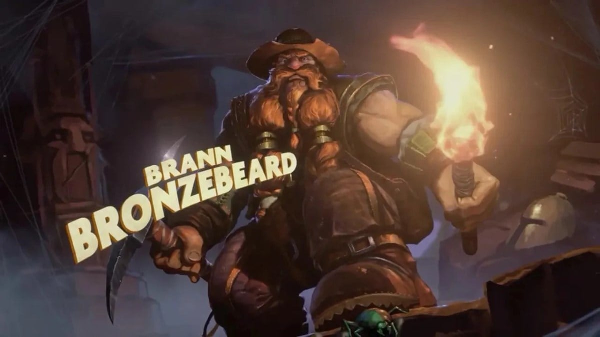 Brann Bronzebeard holding a pickaxe and a torch in WoW The War Within.