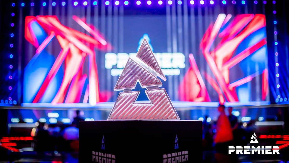 The BLAST trophy sits on a plinth in front of a stage.